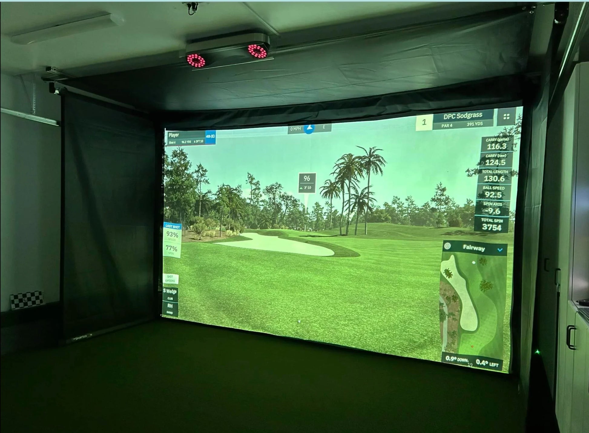 The SportScreen Vanish Series Retractable Golf Studio golf simulator enclosure for indoor golf simulator setup